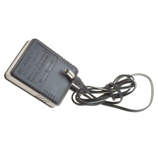 Original Netzteil AC Adapter Output:9V-850mA Plus pol ausen!!